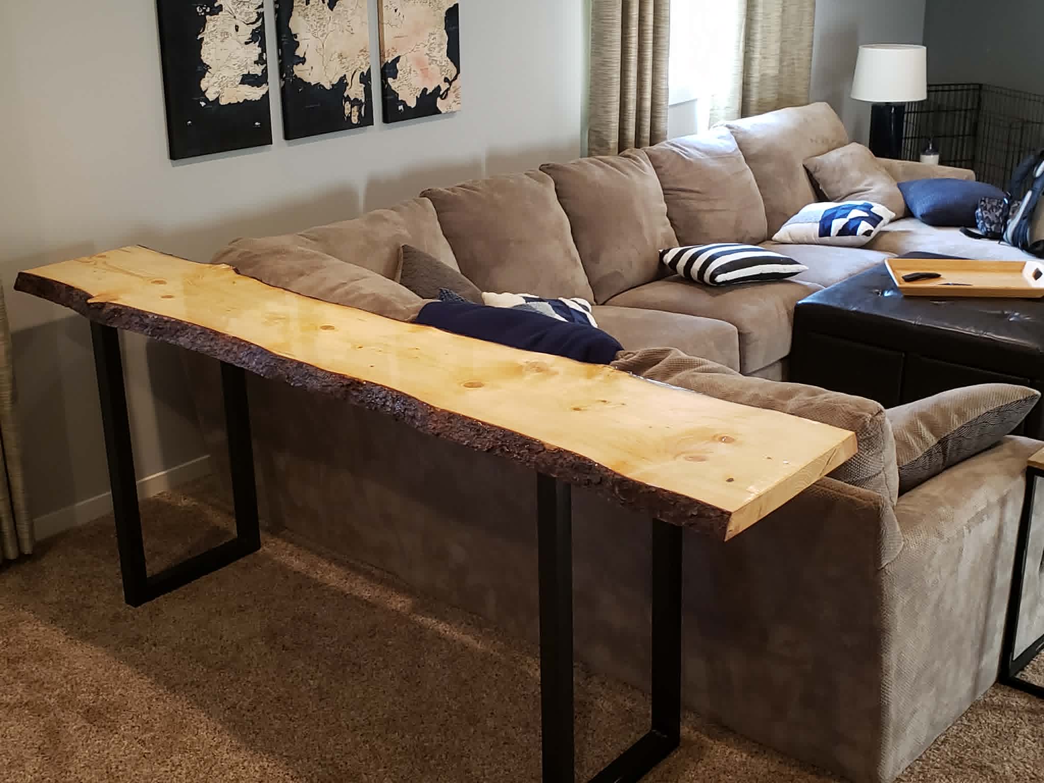 Live-edge wood console table with black steel legs