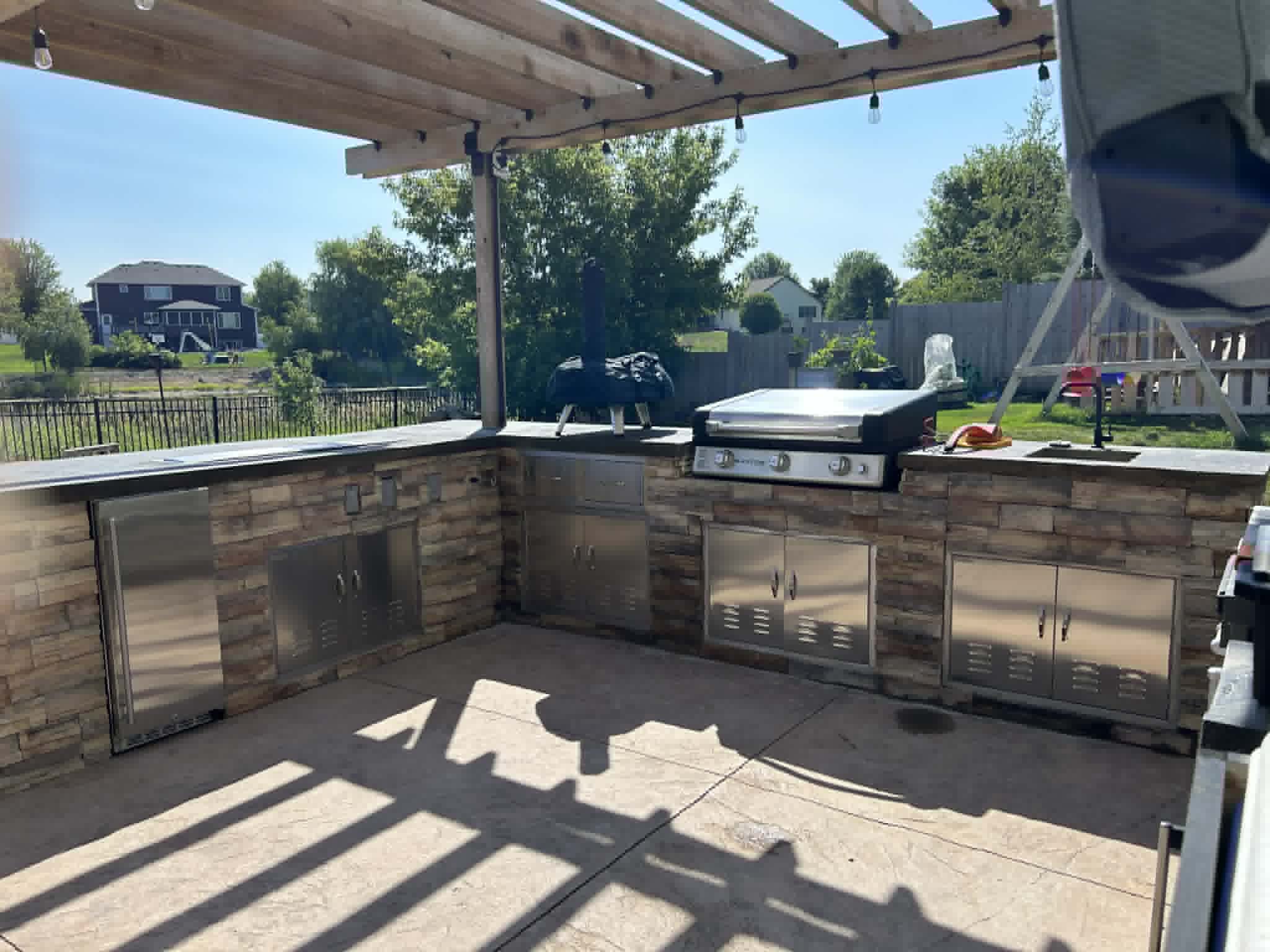 Custom built timber pergola over an outdoor kitchen